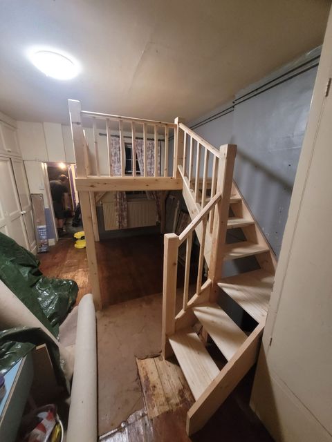 New softwood staircase with balustrade, installed and ready for finishing